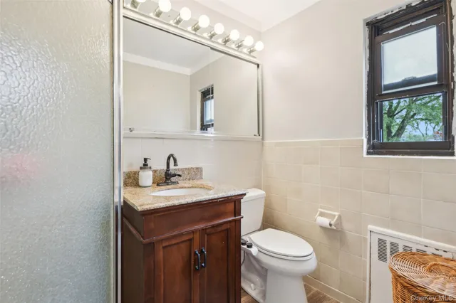 a view of a two chairs in the balcony