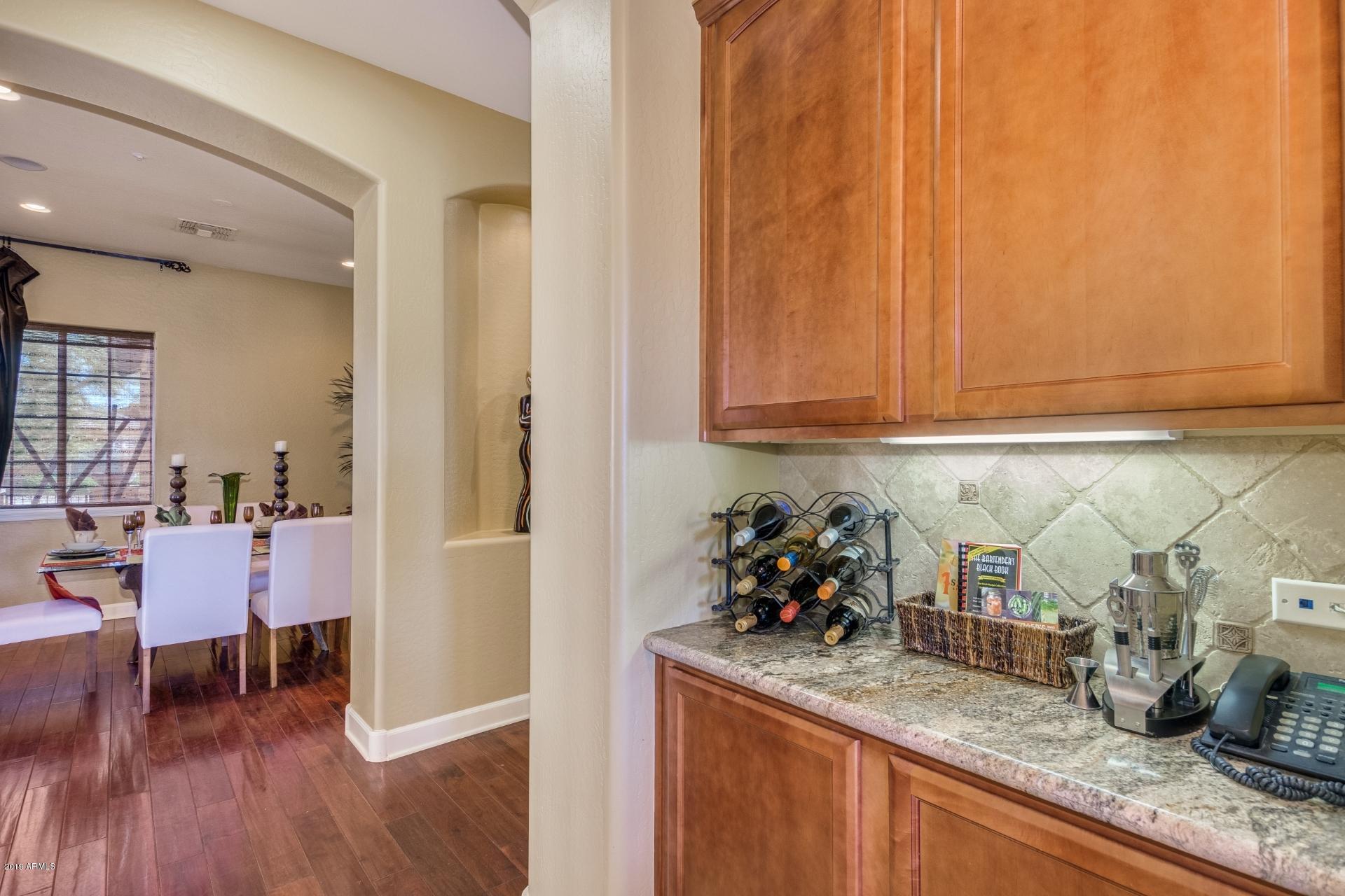 18168 West Narramore Road Goodyear, AZ 85338 - Photo 14 of 36 a kitchen with a sink and cabinets