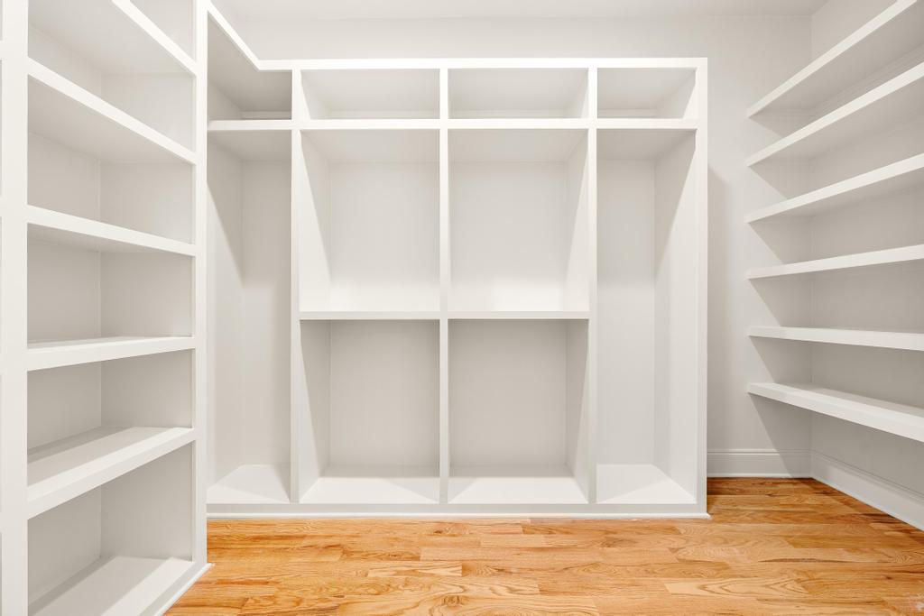 707 Vickery Street Extension Hartwell, GA 30643 - Photo 25 of 50 Ample built-in storage solutions with gleaming hardwood flooring.