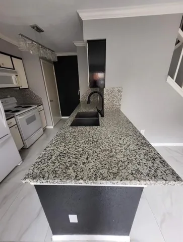 a view of a living room with a couch