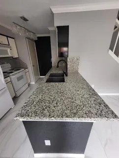 a view of a living room with a couch