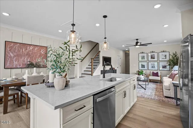 a very nice looking dining room with a table and chairs