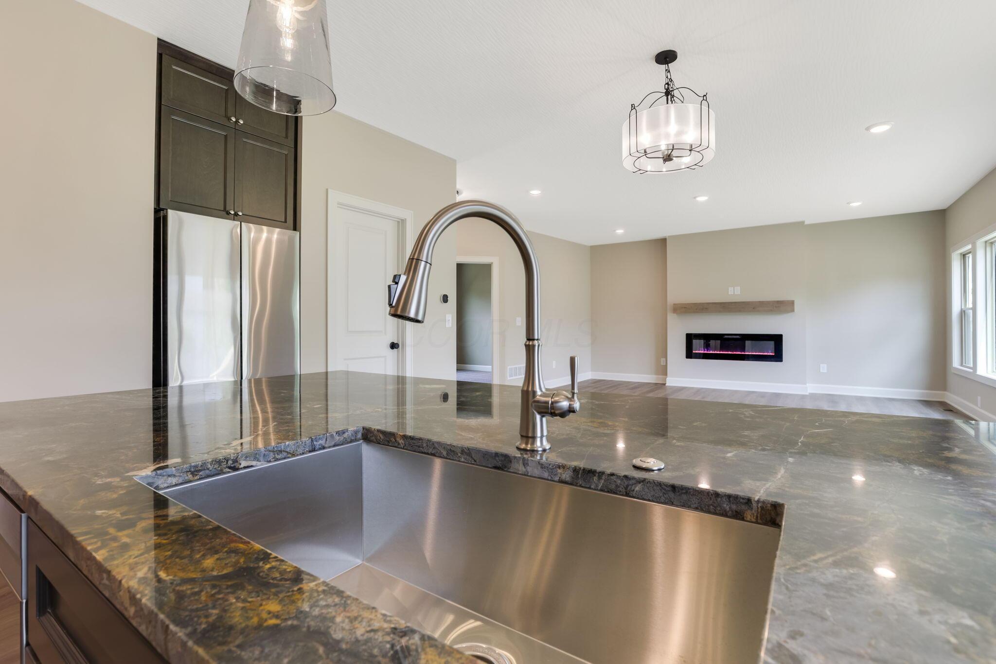 9007 Columbia Road Southwest Pataskala, OH 43062 - Photo 24 of 70 Deep kitchen island sink