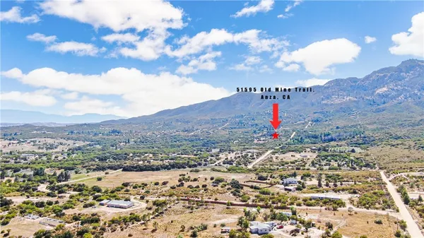 an aerial view of mountain with residential space