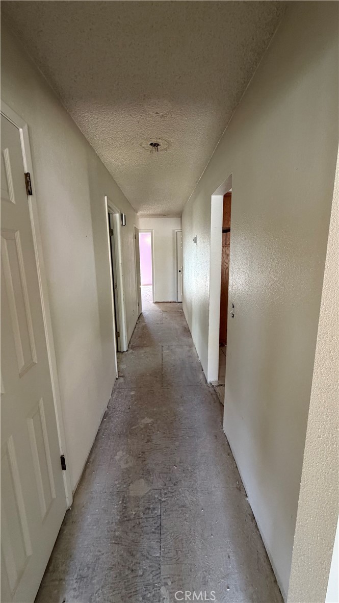 1300 Kensington Drive Merced, CA 95340 - Photo 6 of 10 a view of a hallway