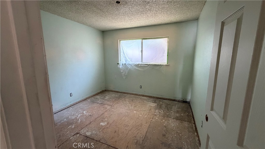1300 Kensington Drive Merced, CA 95340 - Photo 10 of 10 a view of an empty room with a window