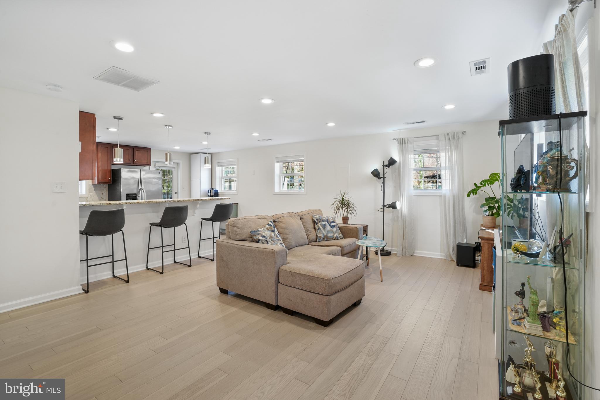 15709 Maple Drive Accokeek, MD 20607 - Photo 11 of 48 a living room with furniture and a flat screen tv