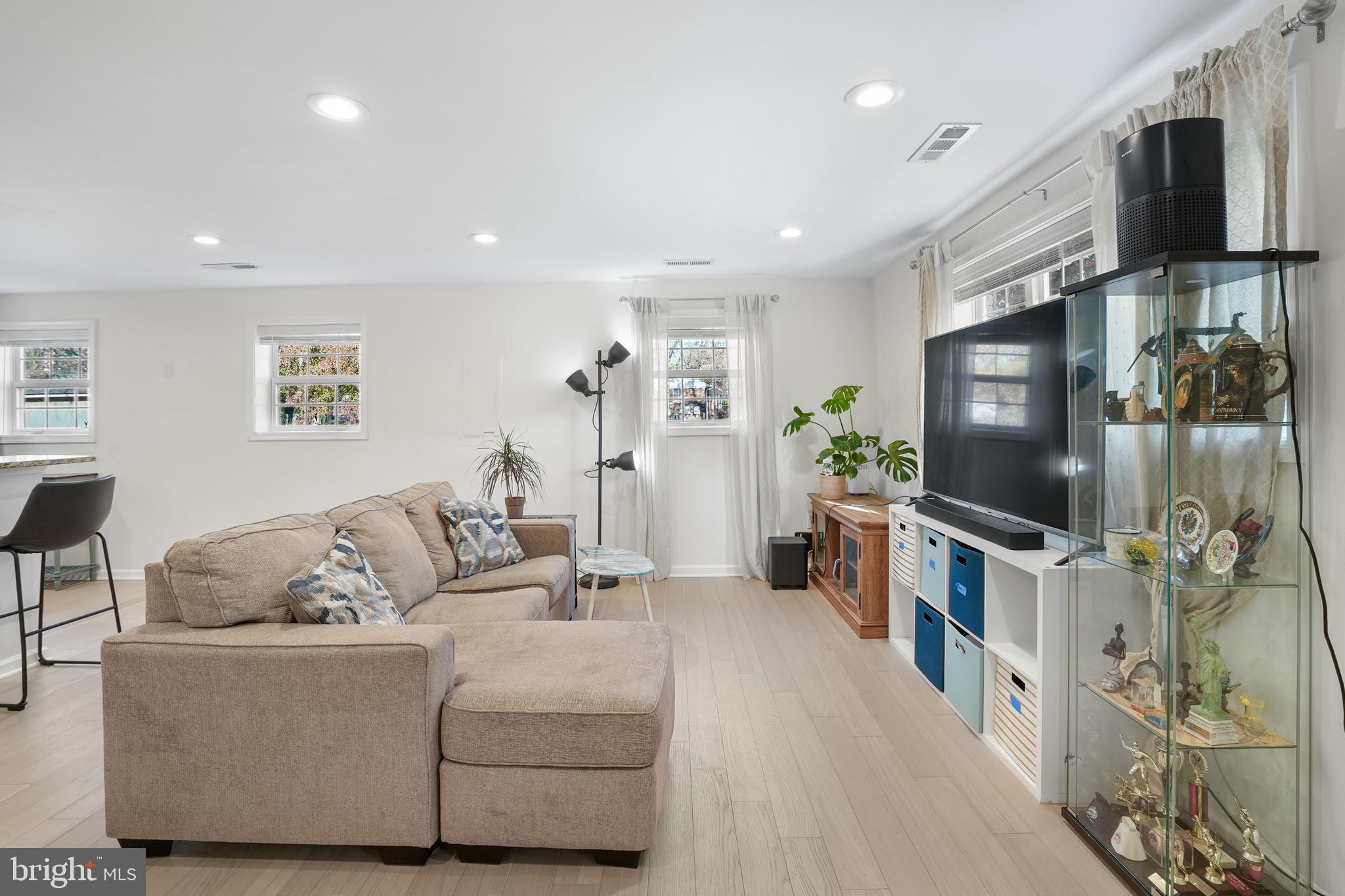 15709 Maple Drive Accokeek, MD 20607 - Photo 12 of 48 a living room with furniture and a flat screen tv
