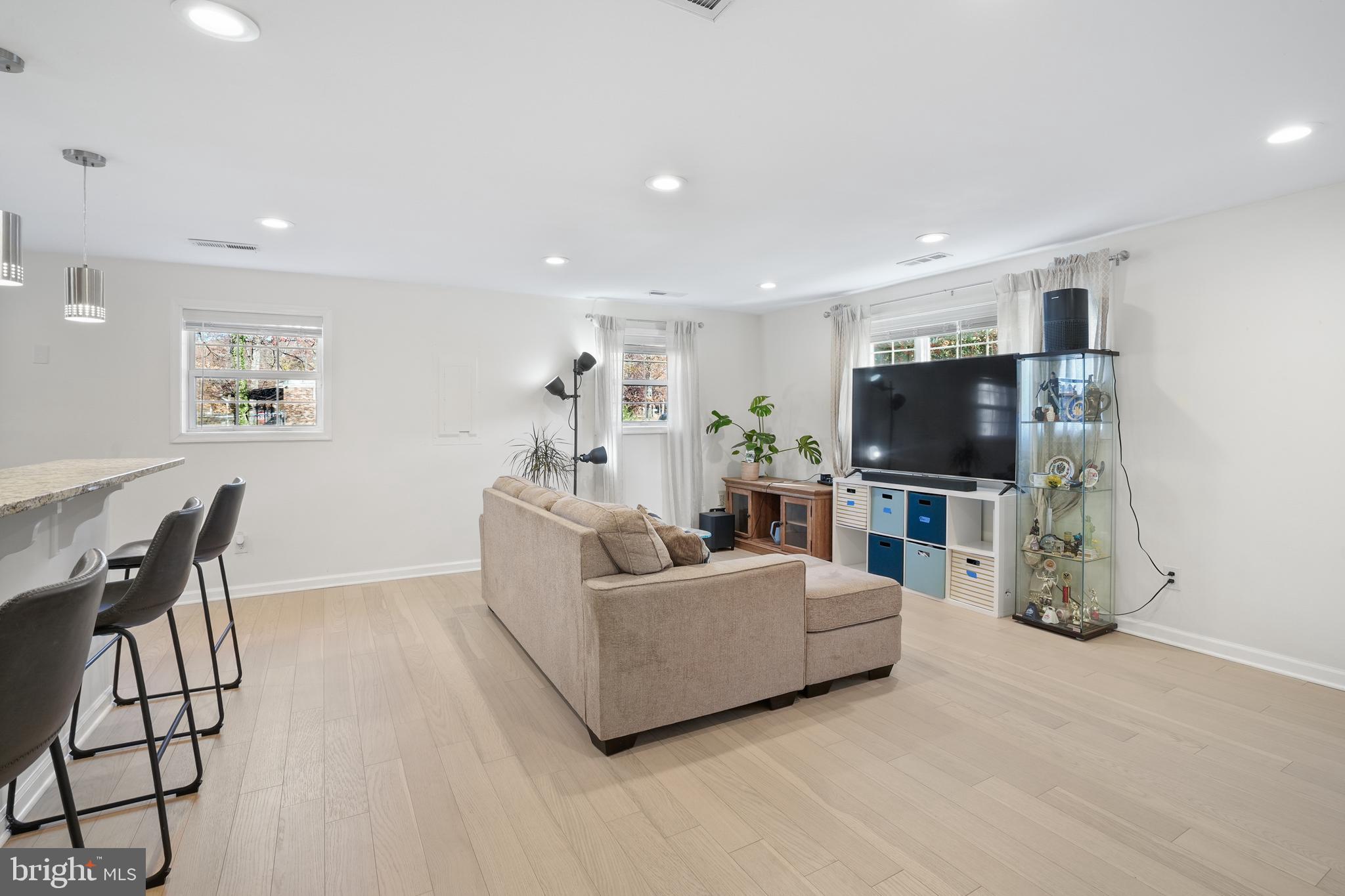 15709 Maple Drive Accokeek, MD 20607 - Photo 14 of 48 a living room with furniture and a flat screen tv