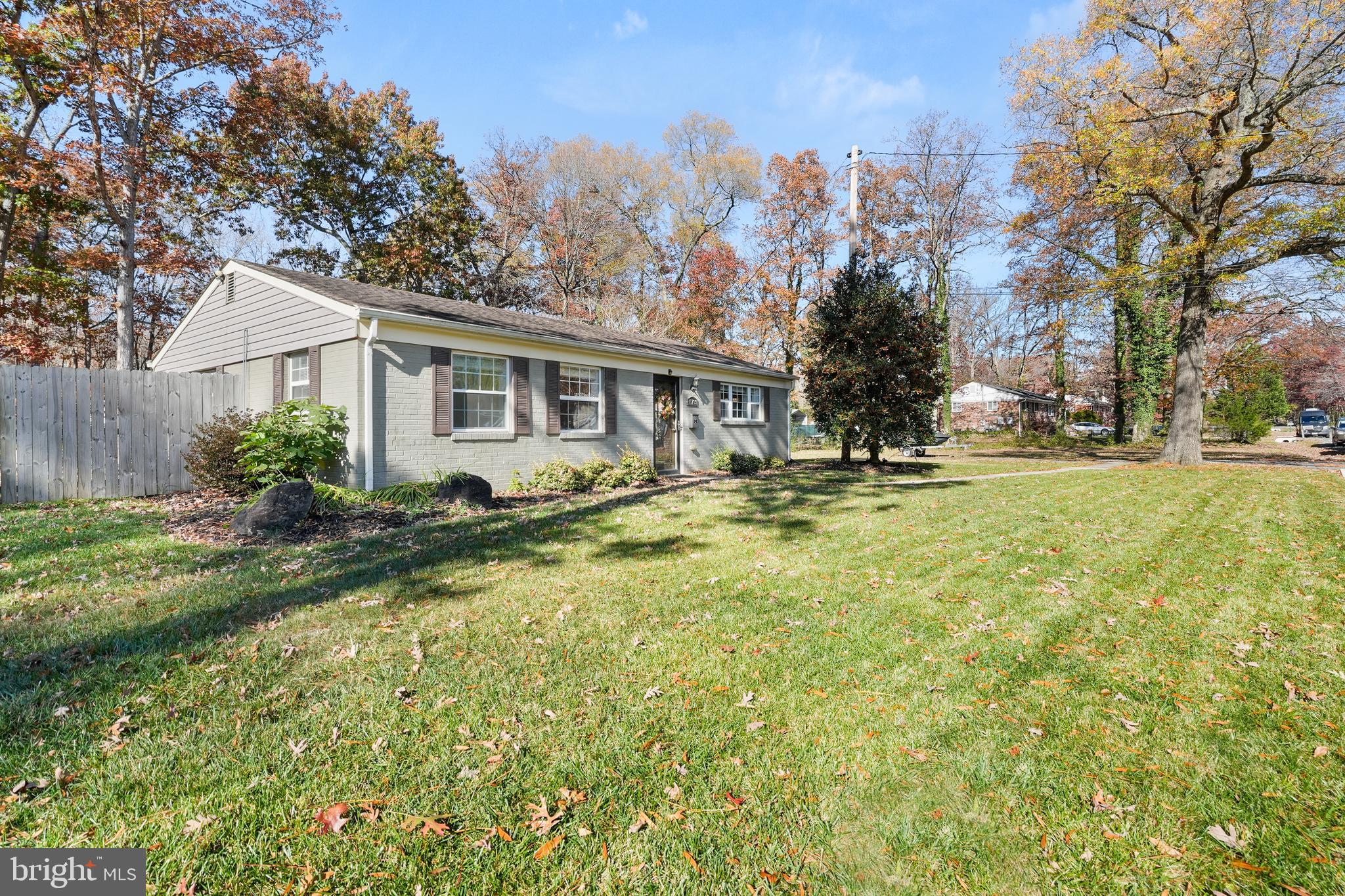 15709 Maple Drive Accokeek, MD 20607 - Photo 2 of 48 a view of a house with a big yard and large trees