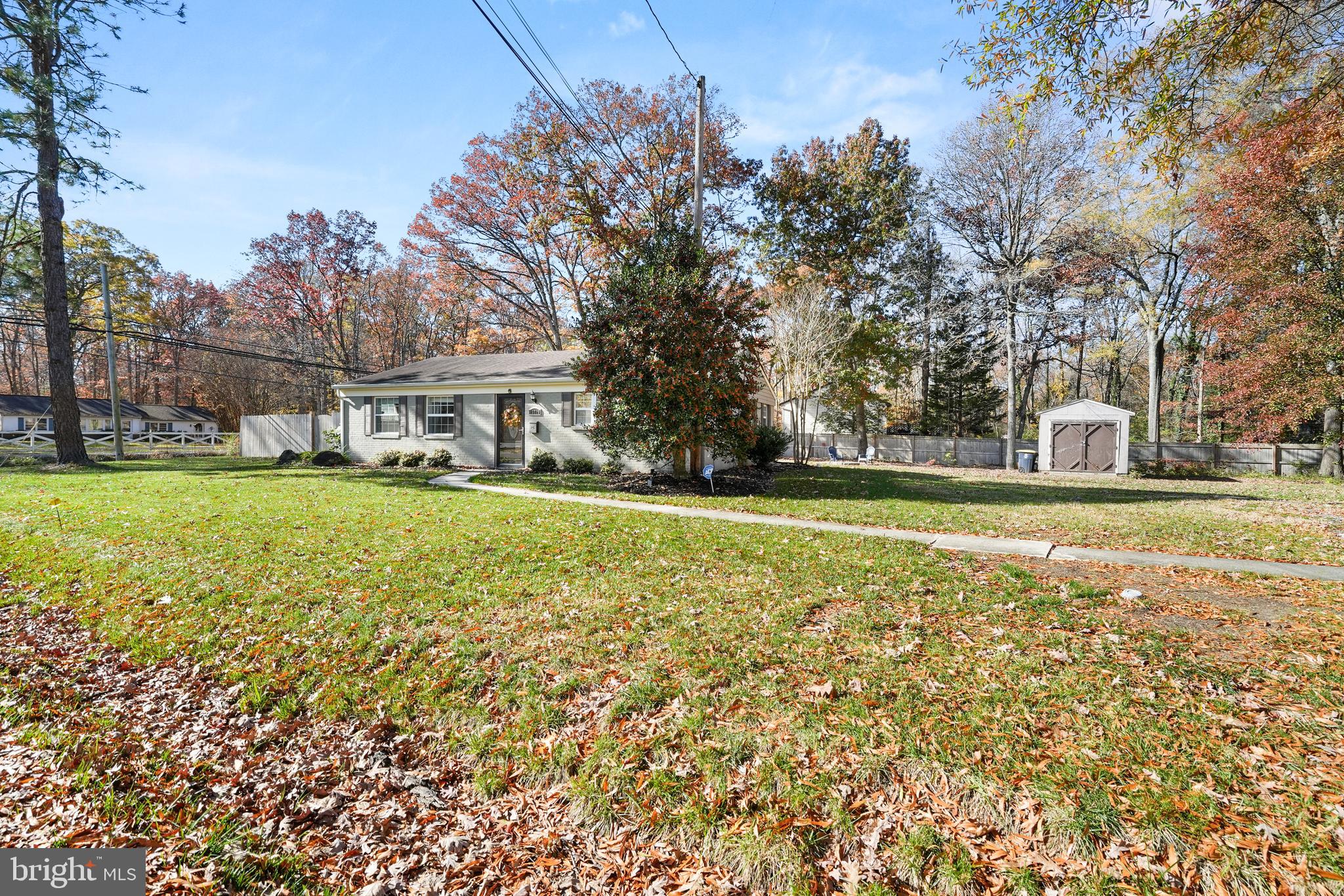15709 Maple Drive Accokeek, MD 20607 - Photo 8 of 48 a view of a house with a big yard and large trees