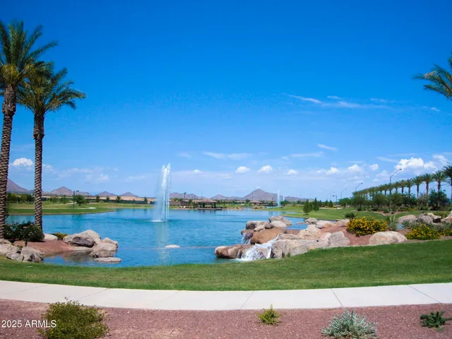 a view of a swimming pool with a slide