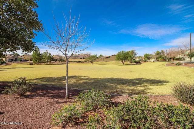 an aerial view of a house with swimming pool