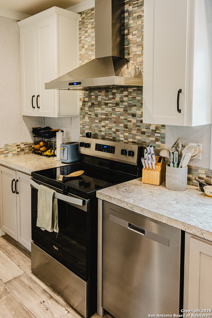 342 PR 4653 Hondo, TX 78861 - Photo 11 of 35 a kitchen with stainless steel appliances granite countertop a stove and a sink
