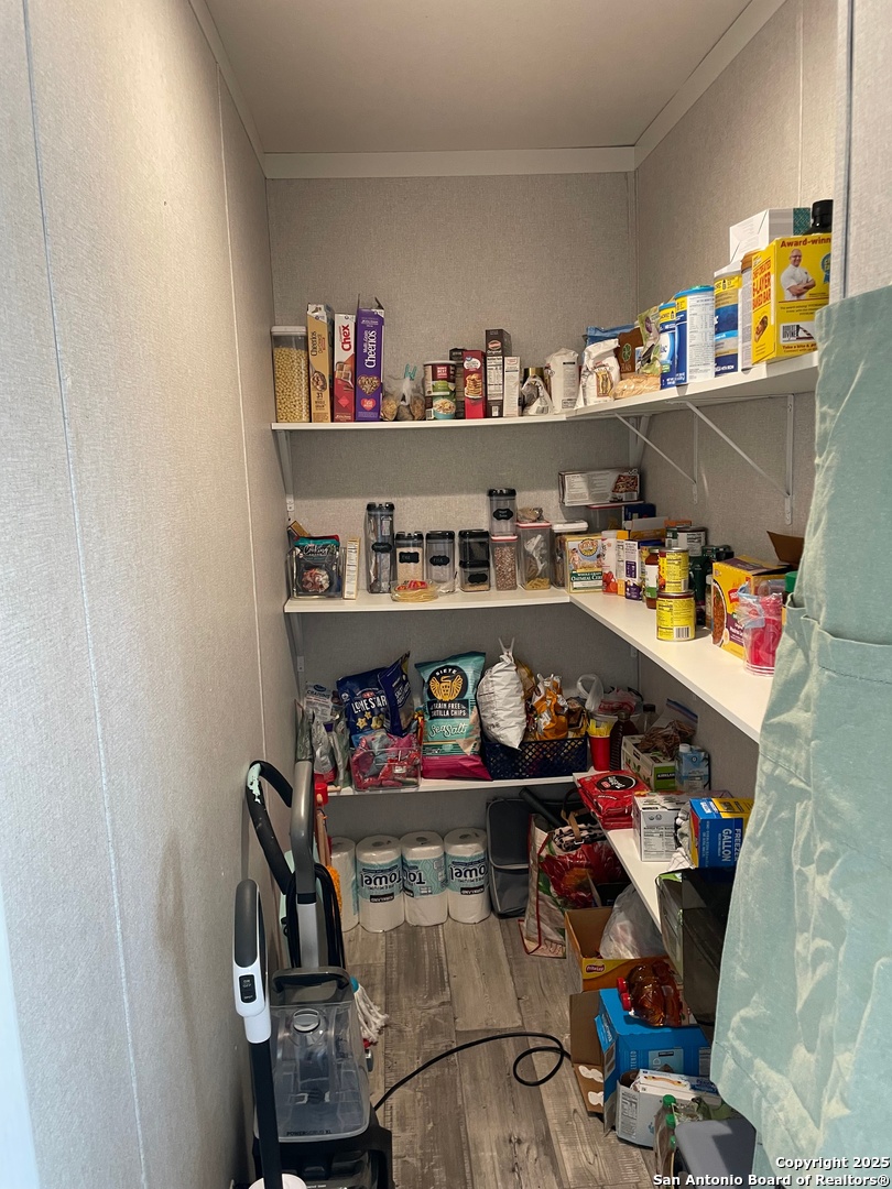 342 PR 4653 Hondo, TX 78861 - Photo 13 of 35 a room with storage and utility