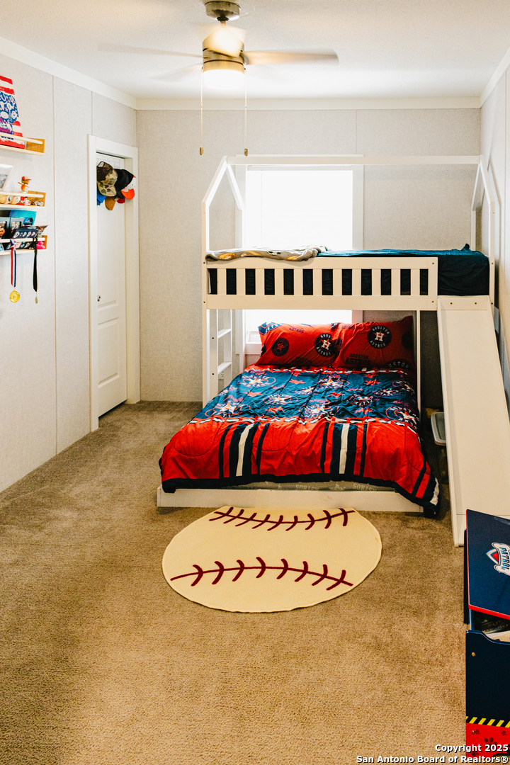 342 PR 4653 Hondo, TX 78861 - Photo 22 of 35 a bedroom with a bed and a window