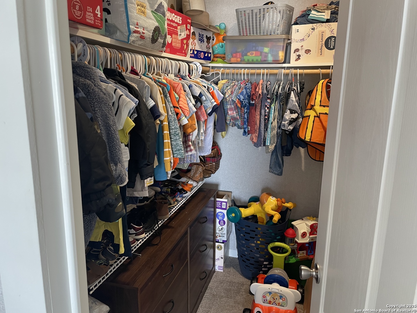 342 PR 4653 Hondo, TX 78861 - Photo 25 of 35 a view of walk in closet with clothes and shoes