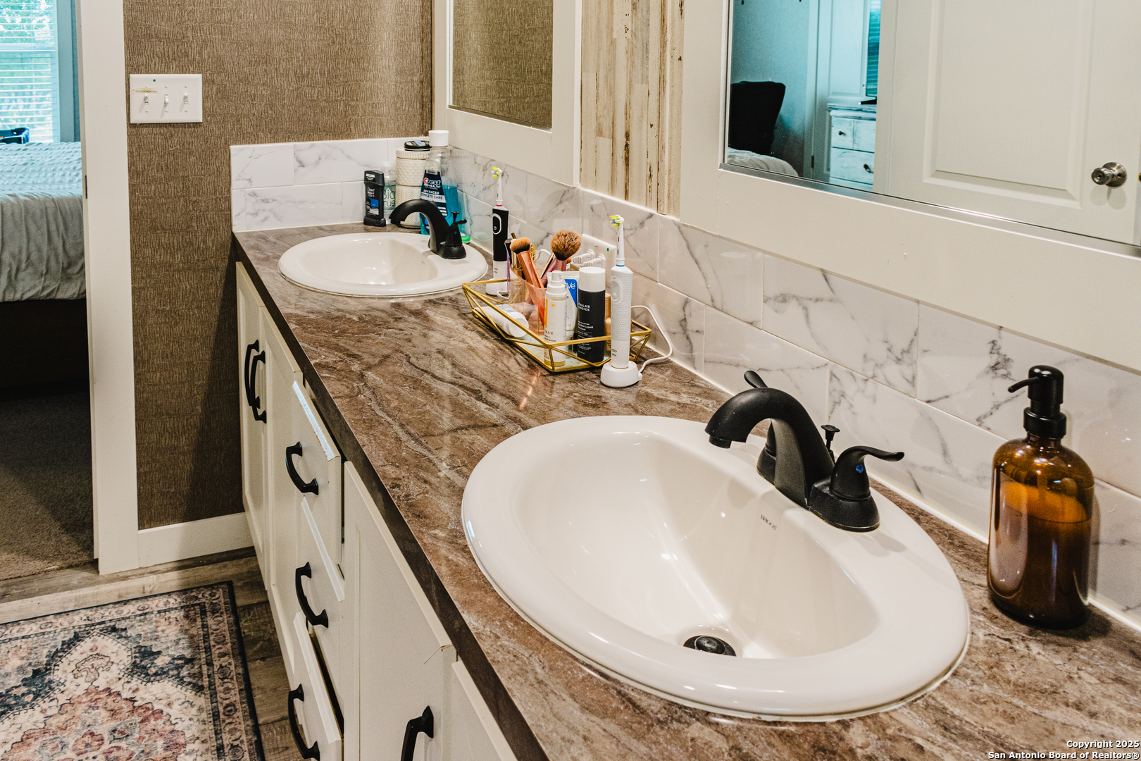 342 PR 4653 Hondo, TX 78861 - Photo 32 of 35 a bathroom with a sink and a mirror
