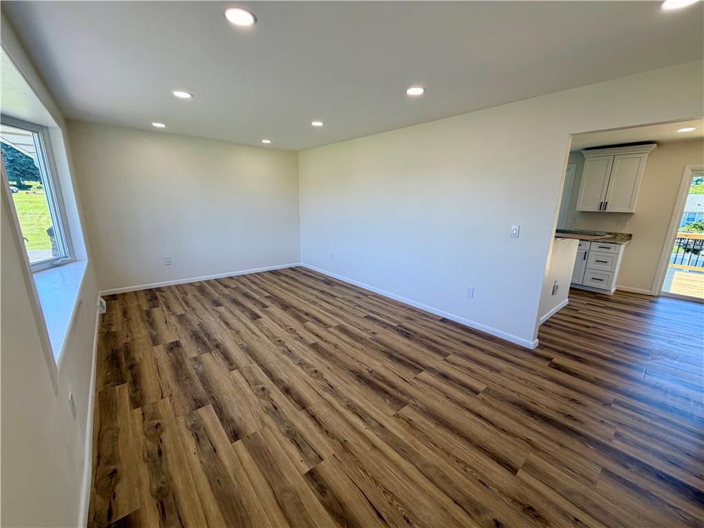 3508 Nazareth Road Easton, PA 18045 - Photo 9 of 25 Recessed dimmable lighting illuminates this versatile living space with rich new LVP flooring, ready for your personal touch.