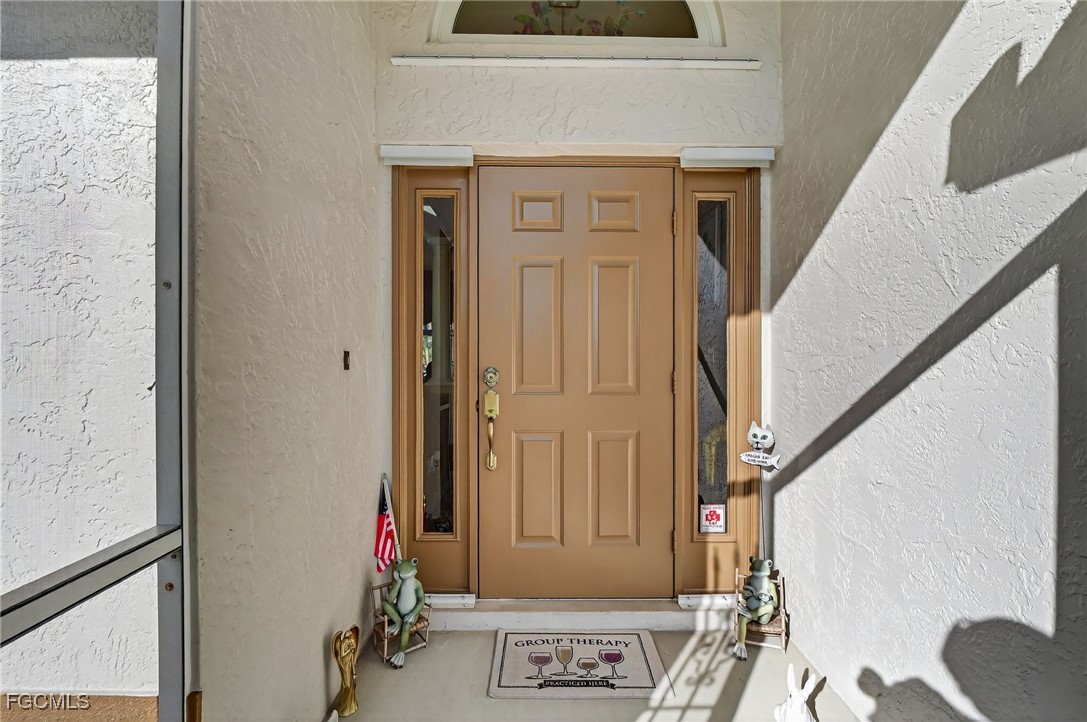 4306 Southwest 3rd Avenue Cape Coral, FL 33914 - Photo 3 of 50 a view of front door of house