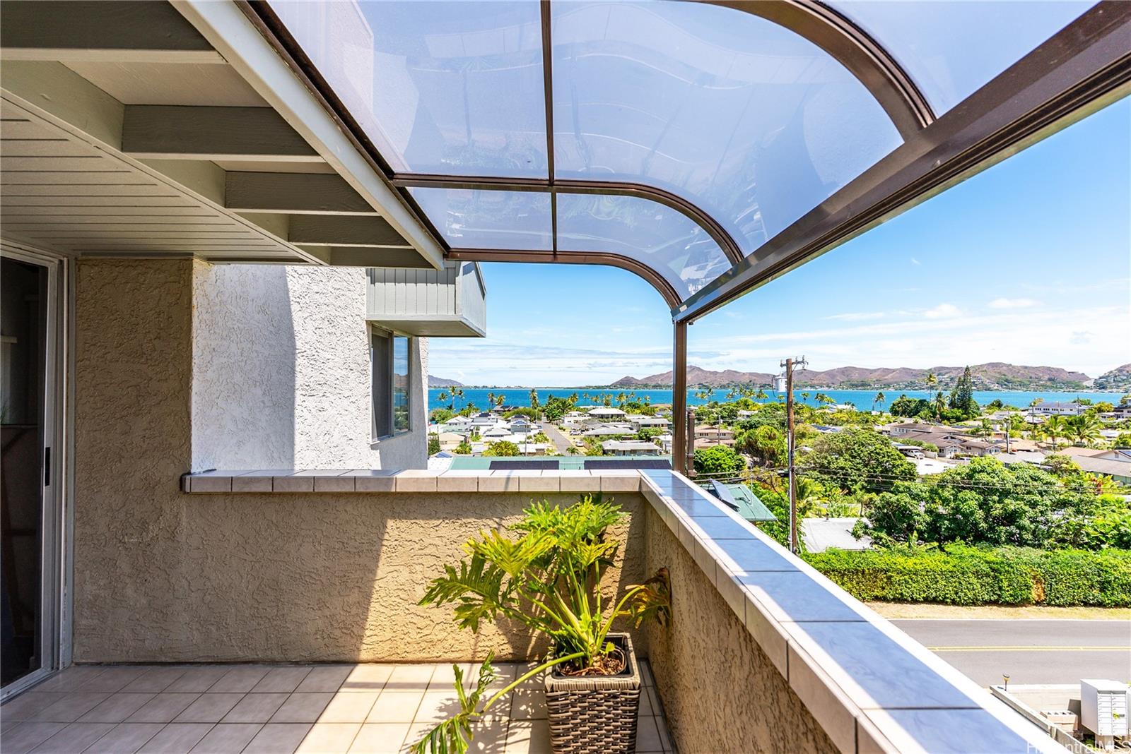 45-081 Lilipuna Road, Unit A Kaneohe, HI 96744 - Photo 6 of 18 Covered ocean-view lanai adjacent to living room.