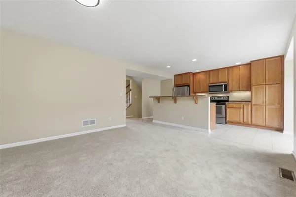 a view of a kitchen with a sink