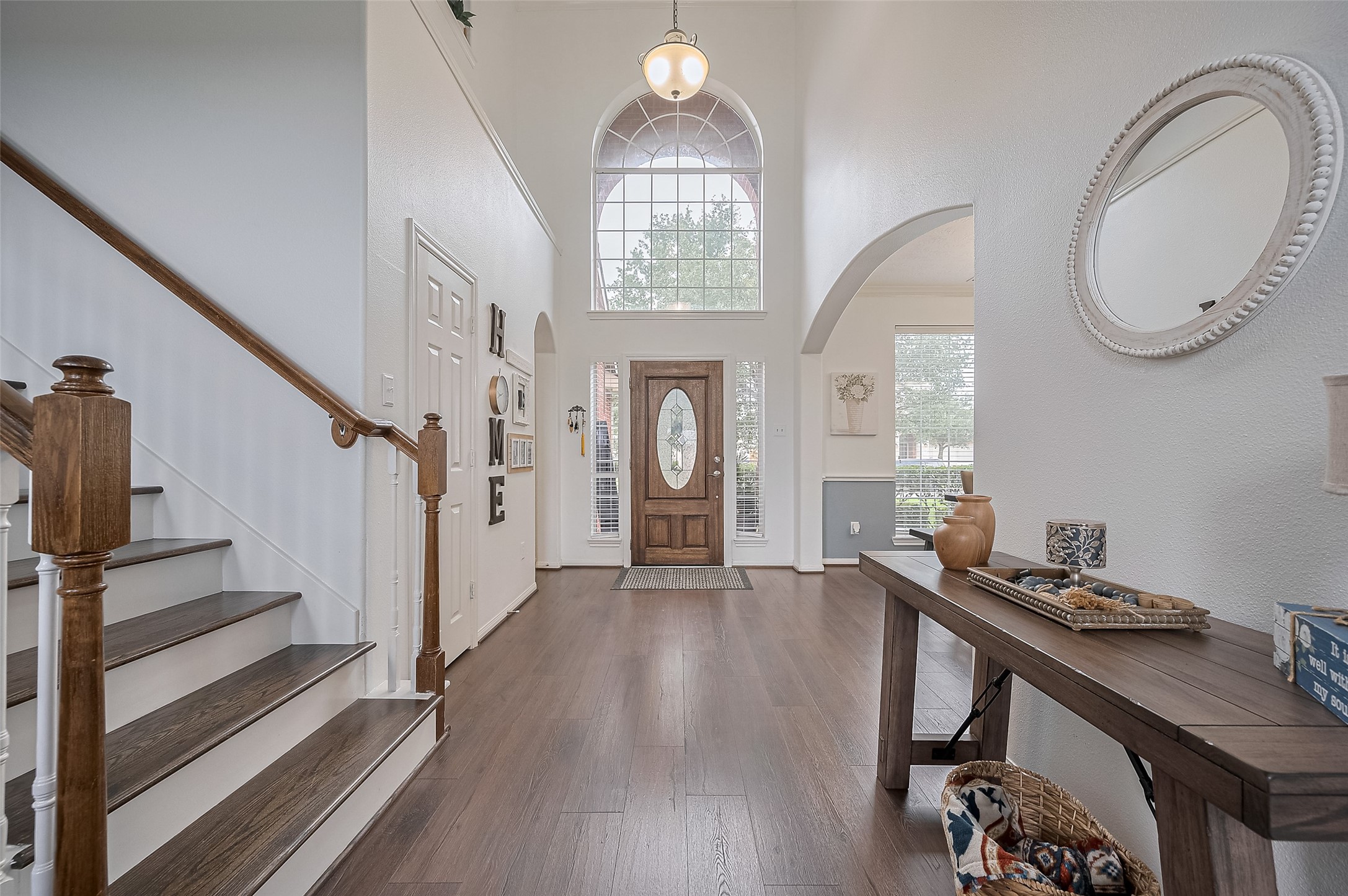 21506 Avalon Queen Drive Spring, TX 77379 - Photo 4 of 46 Step inside and be greeted by a dramatic two-story foyer with soaring ceilings.