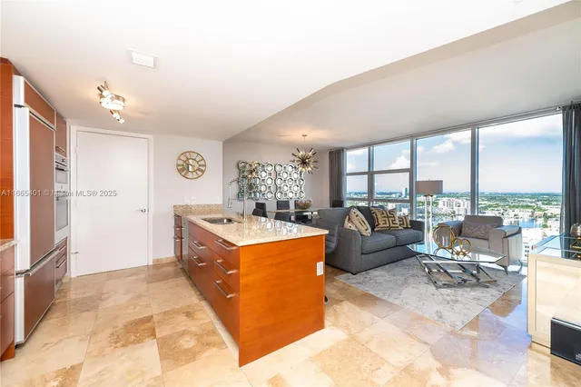 a view of a building with wooden fence