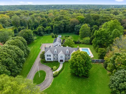 an aerial view of a house with a garden