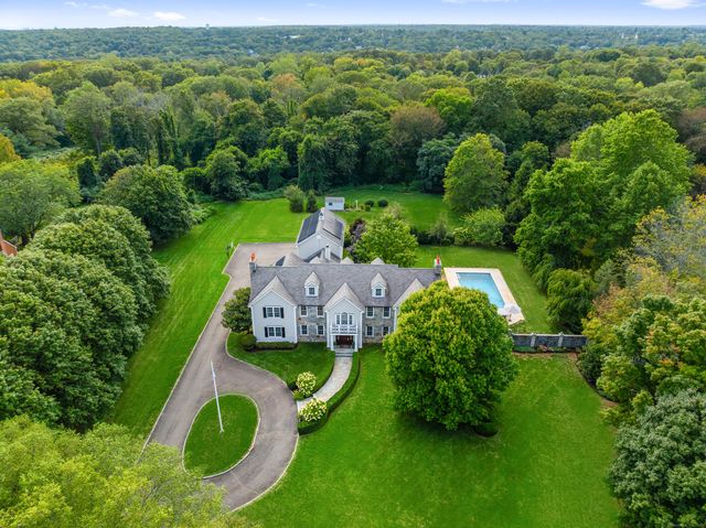 an aerial view of a house with a garden