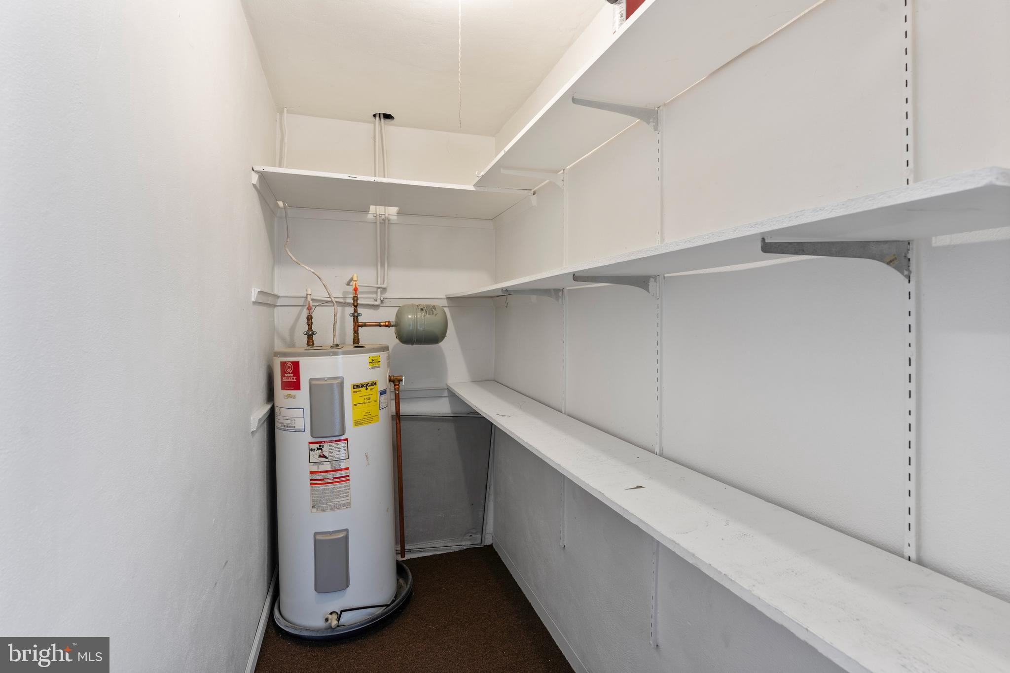 1224 Guildford Road Glen Burnie, MD 21060 - Photo 11 of 22 a storage room with washer and dryer