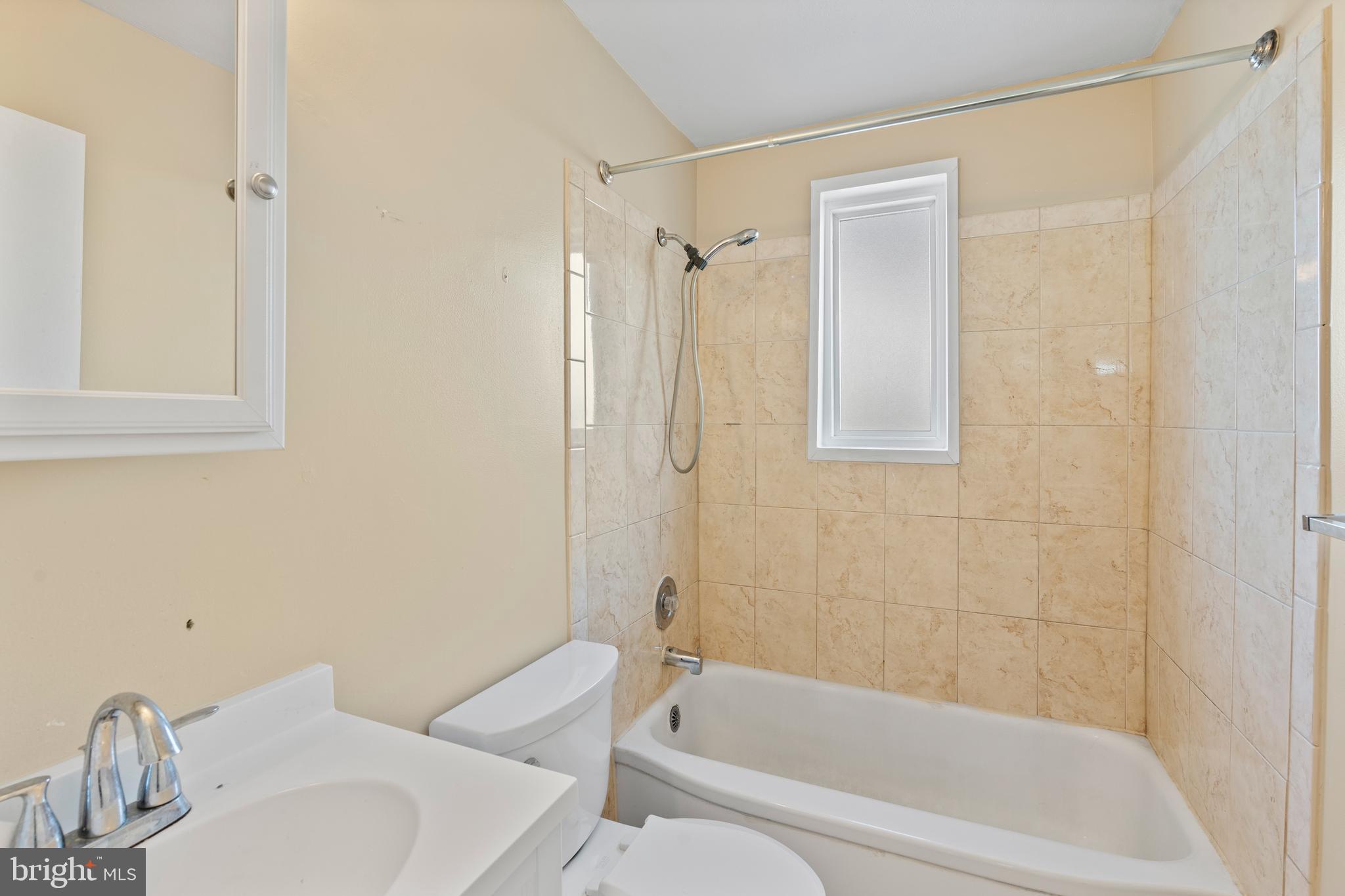 1224 Guildford Road Glen Burnie, MD 21060 - Photo 12 of 22 a bathroom with a sink toilet and shower