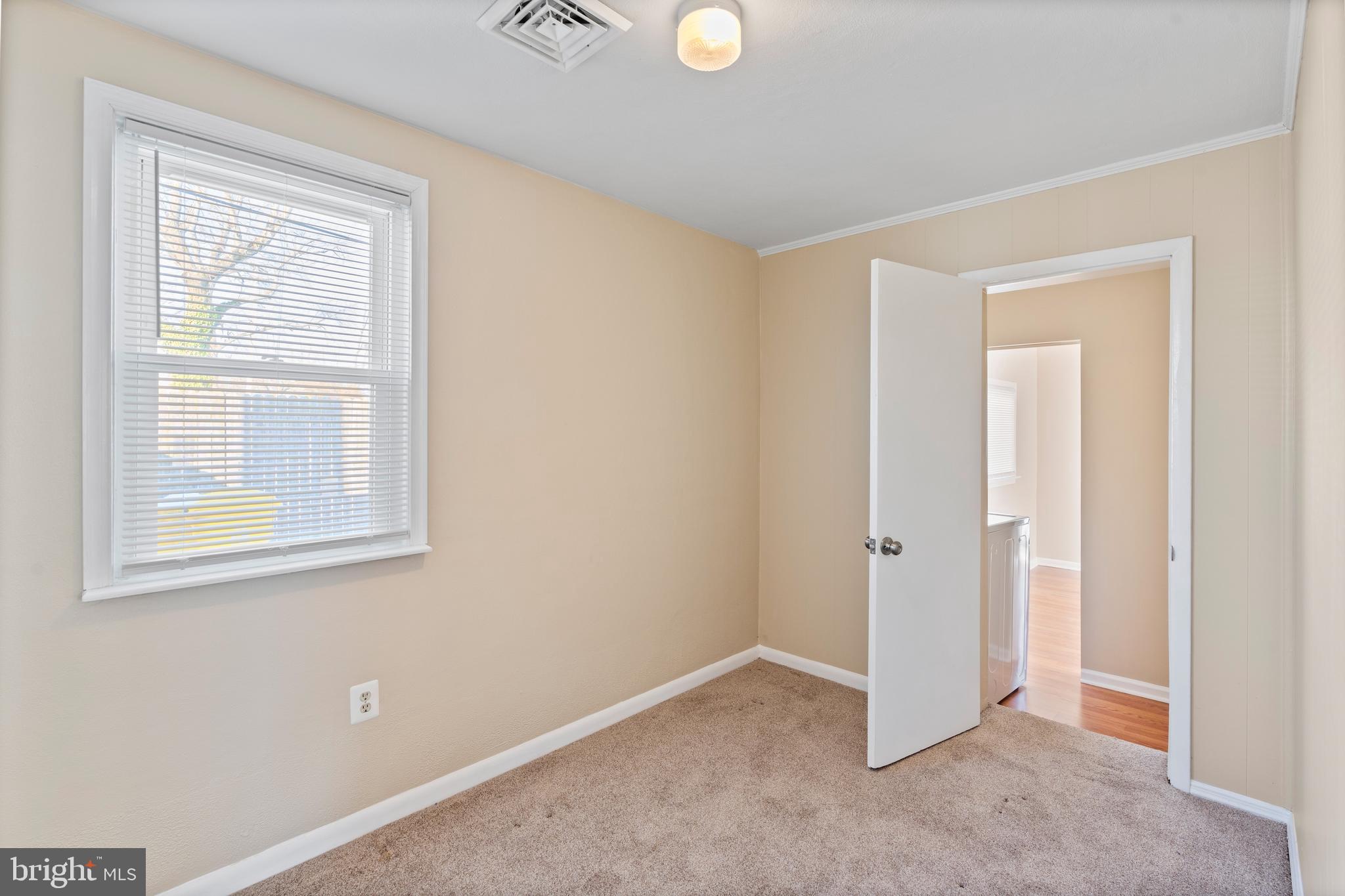 1224 Guildford Road Glen Burnie, MD 21060 - Photo 15 of 22 a view of an empty room with a window