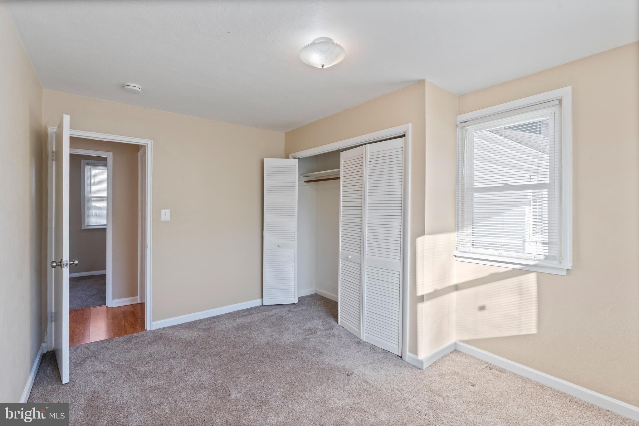 1224 Guildford Road Glen Burnie, MD 21060 - Photo 17 of 22 an empty room with windows