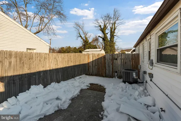 a view of a backyard of the house