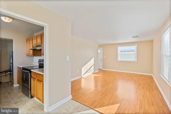 a view of a kitchen with kitchen and a window