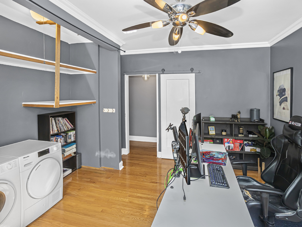 815 Brummel Street, Unit 2 Evanston, IL 60202 - Photo 13 of 16 a view of a room with gym equipment