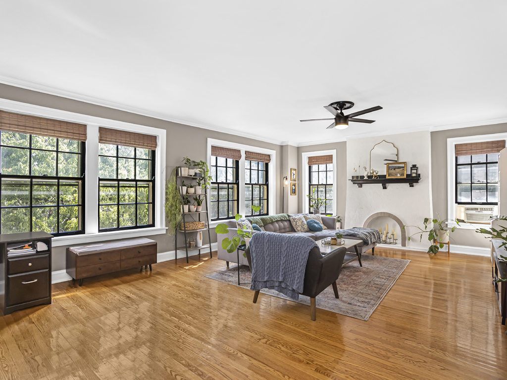815 Brummel Street, Unit 2 Evanston, IL 60202 - Photo 2 of 16 a living room with furniture and a large window