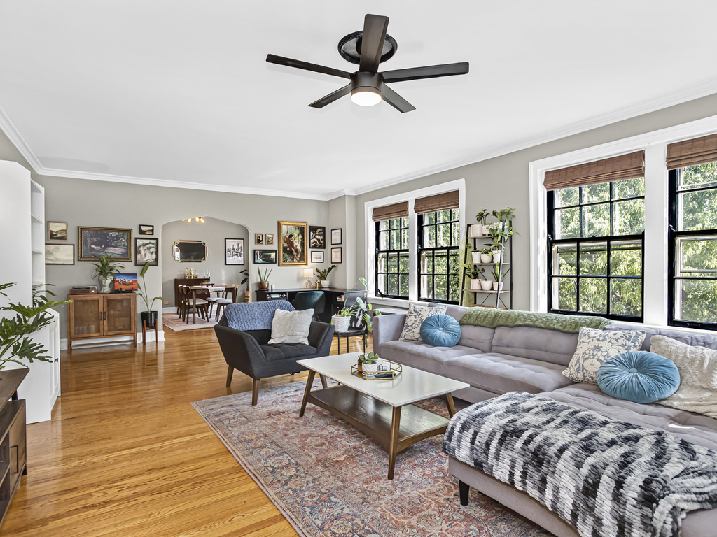 815 Brummel Street, Unit 2 Evanston, IL 60202 - Photo 5 of 16 a living room with furniture and a large window