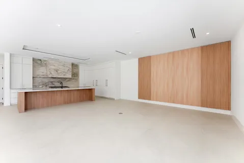 a bathroom with a double vanity sink and mirror