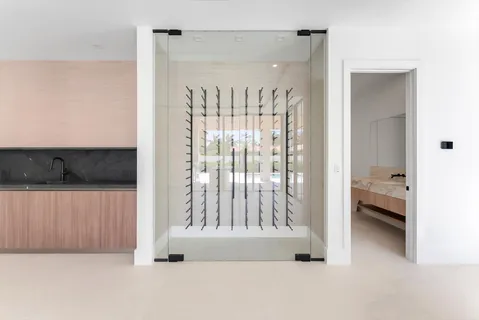 an aerial view of residential houses with yard