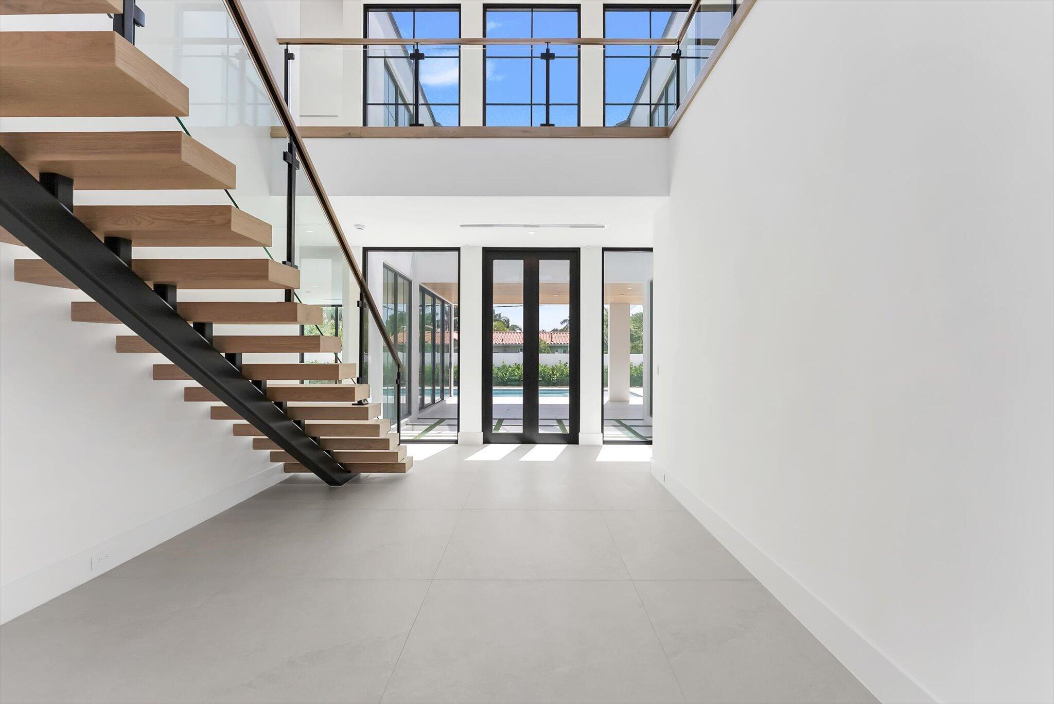 880 Northeast 3rd Avenue Boca Raton, FL 33432 - Photo 9 of 100 a view of entryway with hall