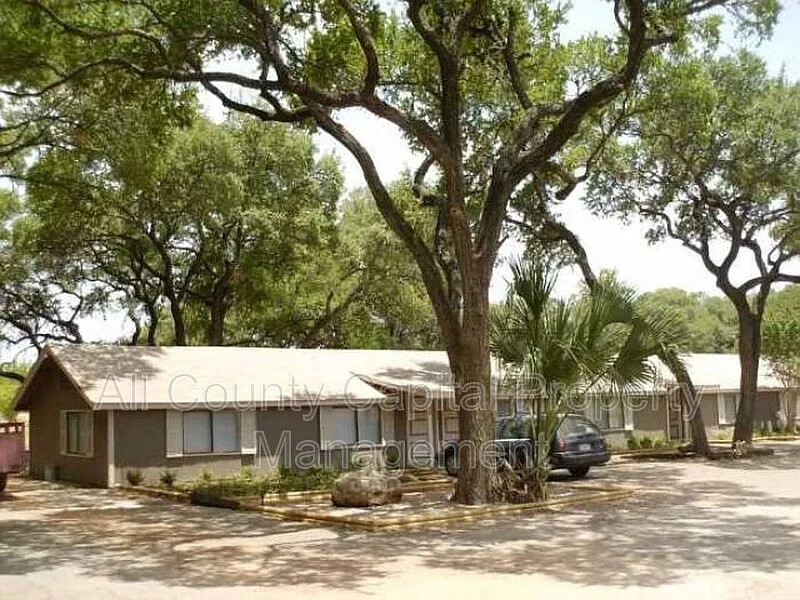 3800 Allegro Lugar Street, Unit 4B Austin, TX 78749 - Photo 10 of 10 a front view of a house with a yard