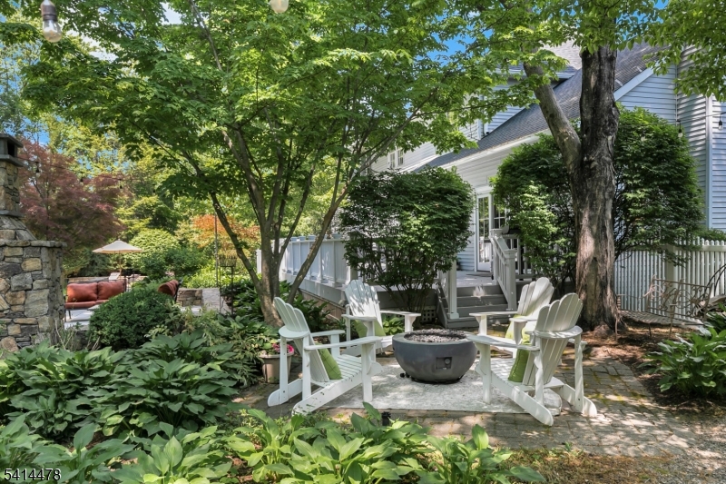 33 St Nickolas Way Bernards, NJ 07920 - Photo 48 of 50 a view of a patio with table and chairs potted plants and large tree