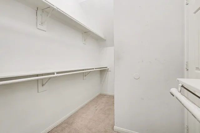 a view of a room with racks on the wall