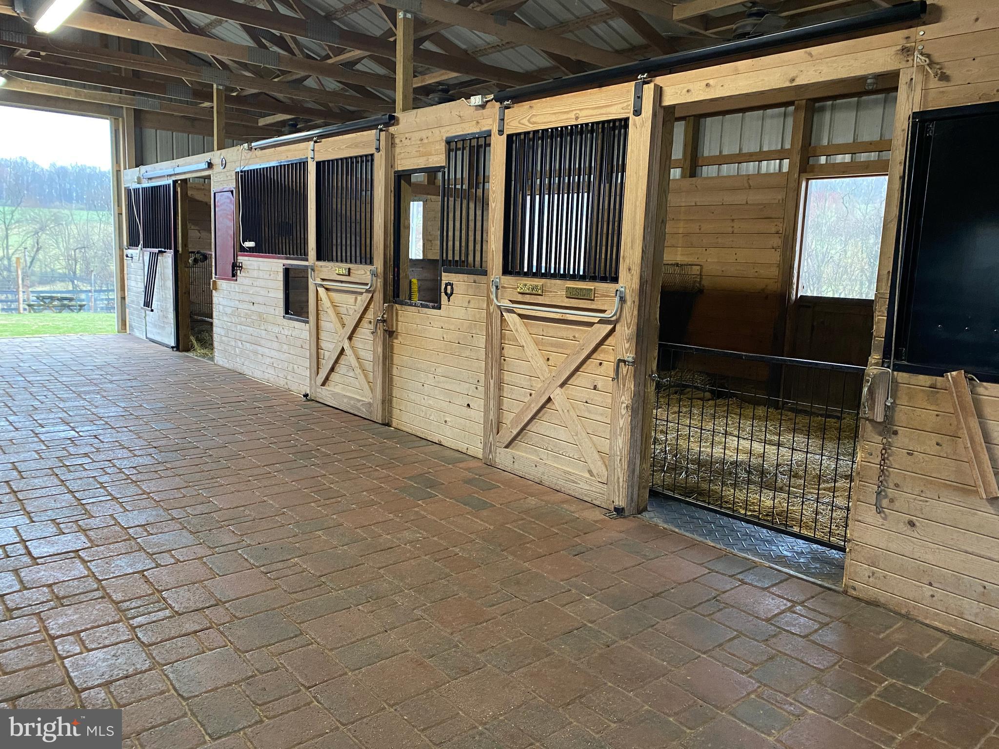 1558 Bollinger Road Westminster, MD 21157 - Photo 12 of 100 Main center aisle barn with 7 stalls