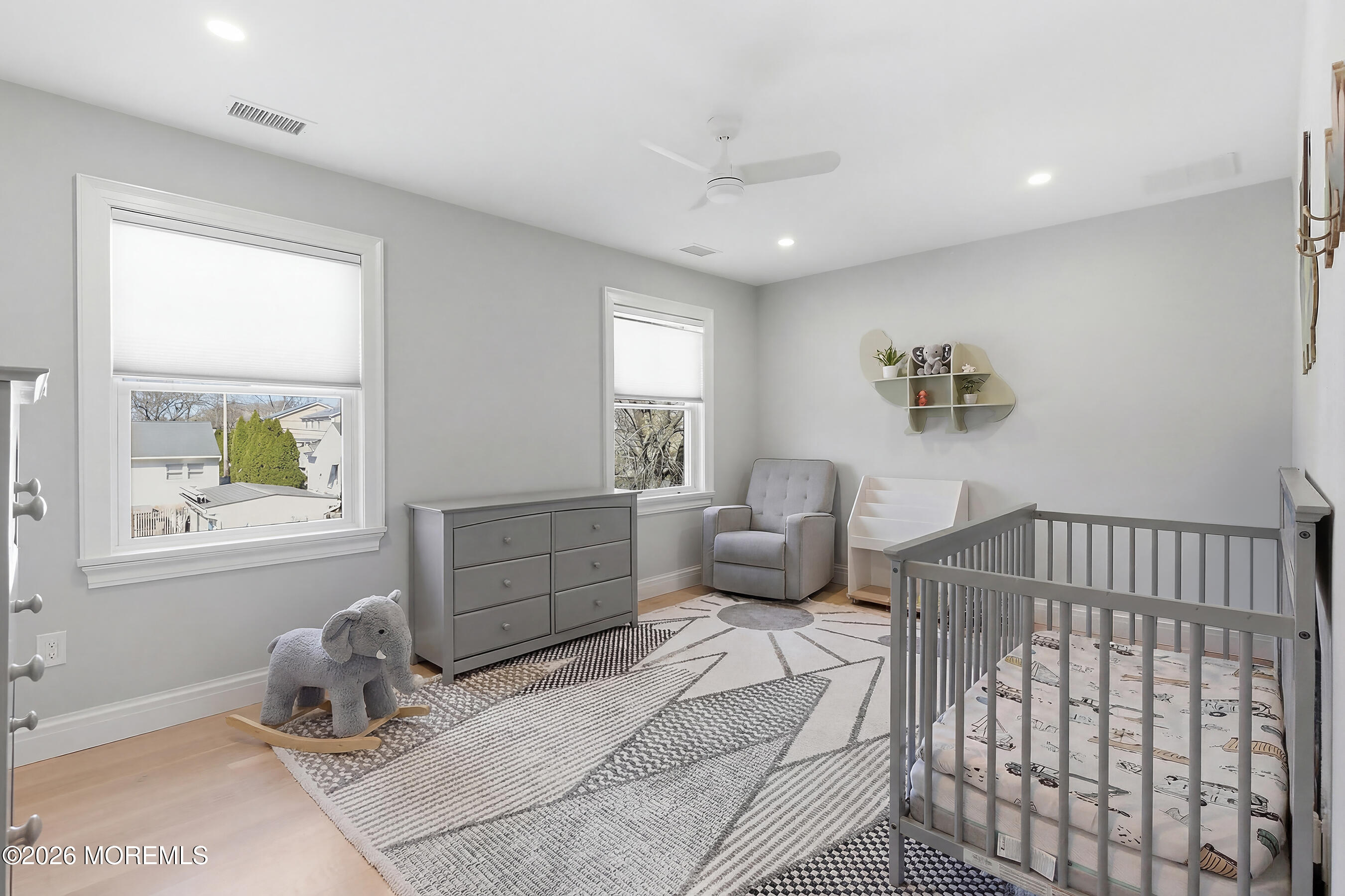1603 Jackson Street Point Pleasant, NJ 08742 - Photo 19 of 45 a bedroom with furniture and a window