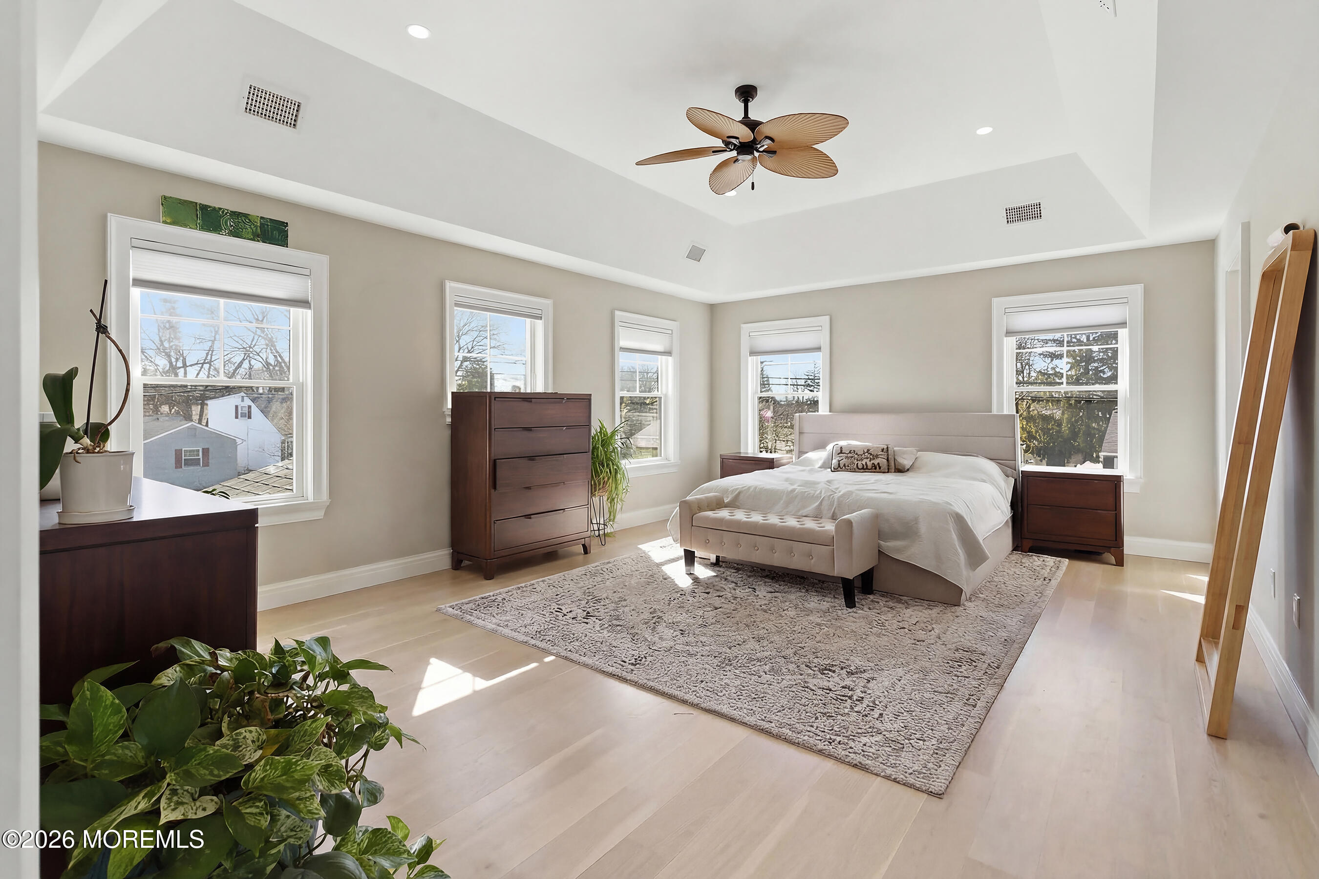 1603 Jackson Street Point Pleasant, NJ 08742 - Photo 20 of 45 a bedroom with a bed and ceiling fan