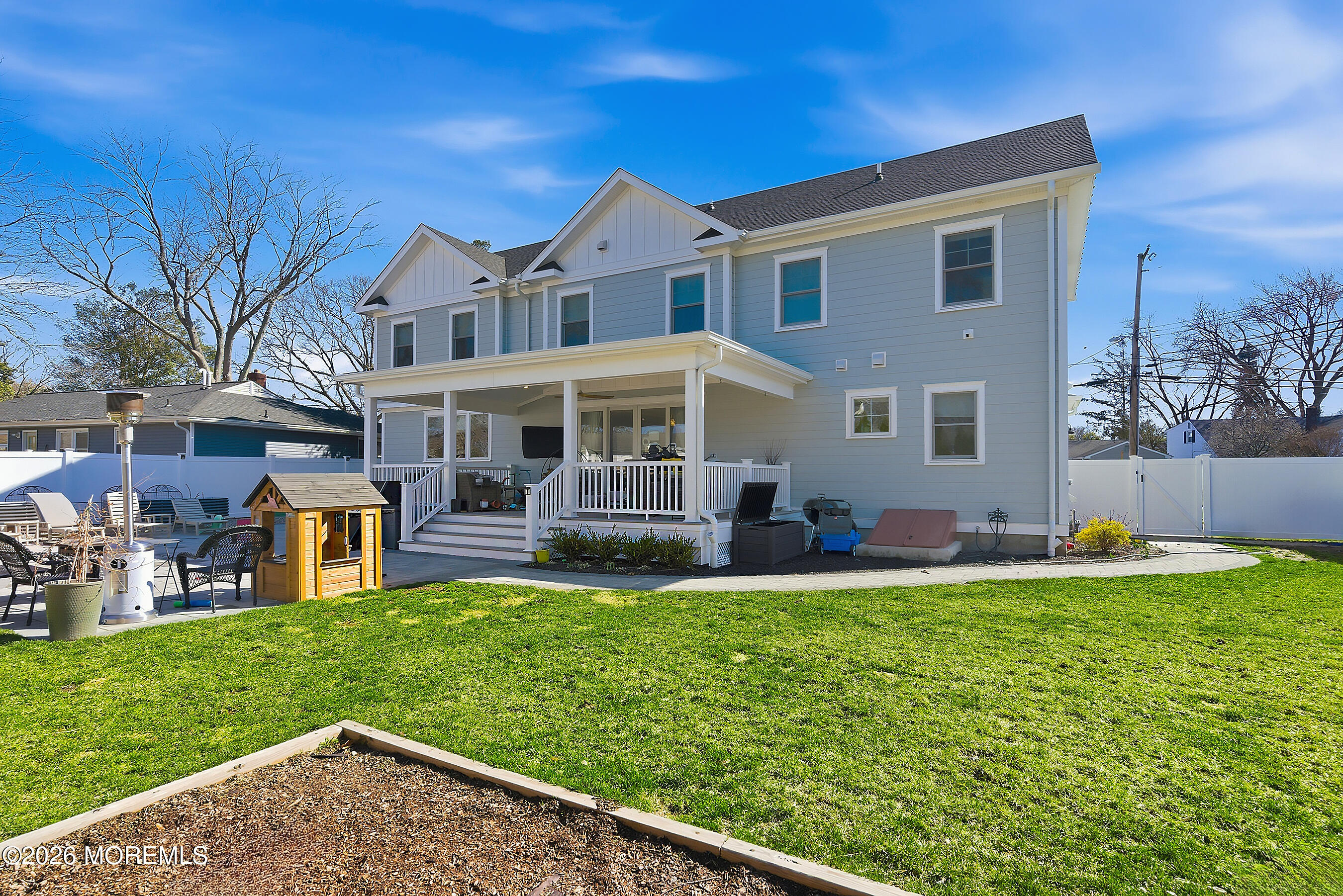 1603 Jackson Street Point Pleasant, NJ 08742 - Photo 28 of 45 a view of a house with a yard and sitting area