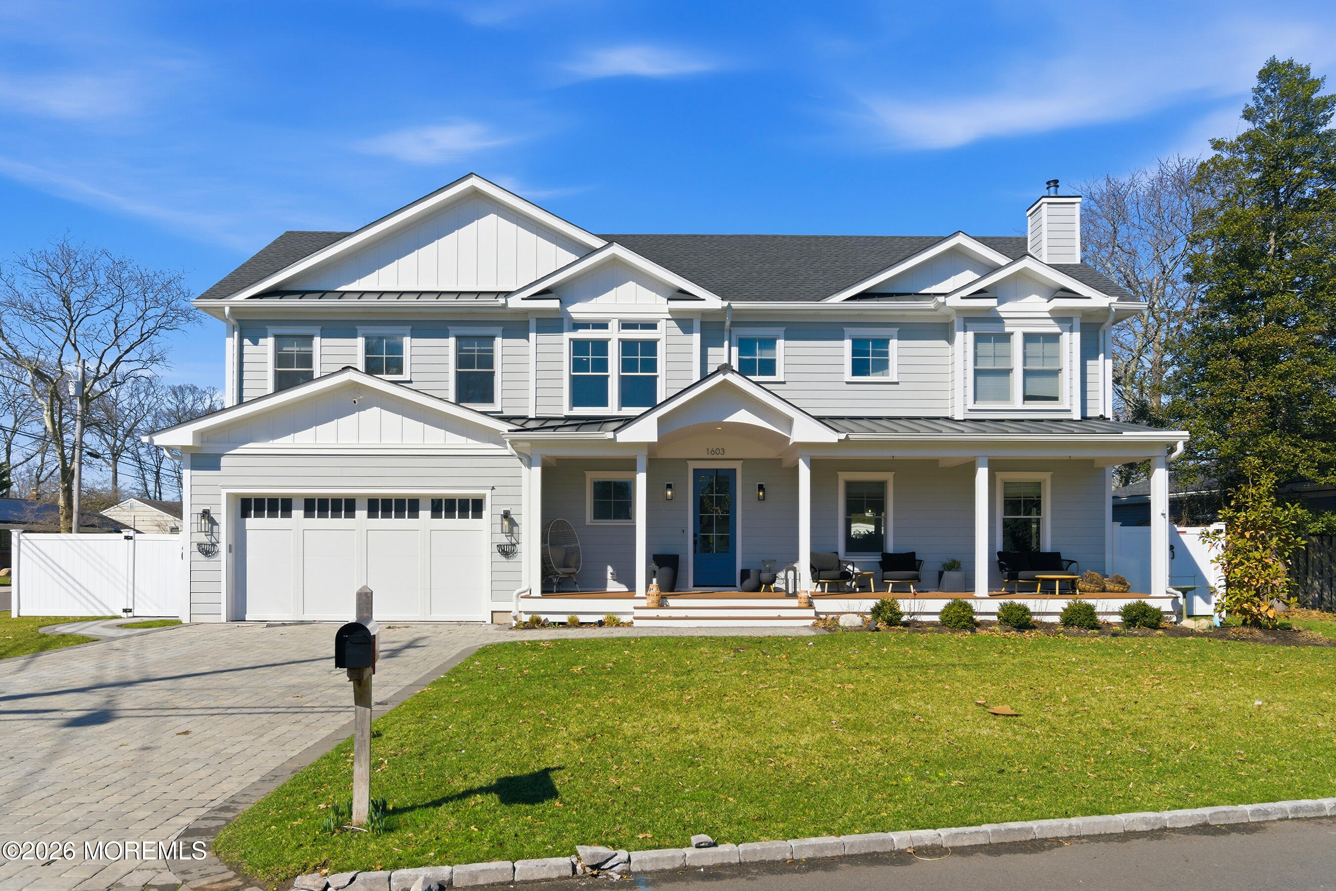 1603 Jackson Street Point Pleasant, NJ 08742 - Photo 31 of 45 a front view of a house with garden